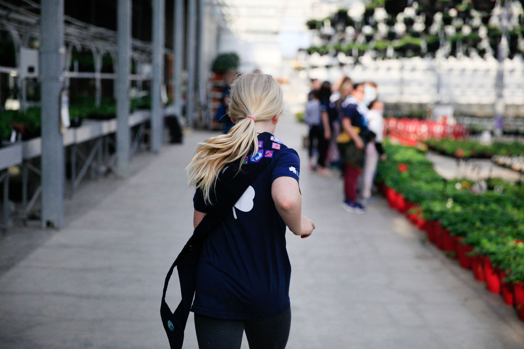 Girl Guide running to meet group