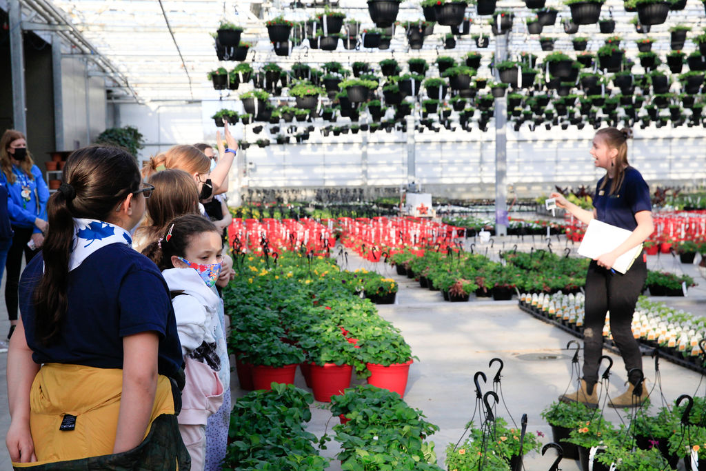 Salisbury Staff giving greenhouse tour | Salisbury Enjoy - St Albert