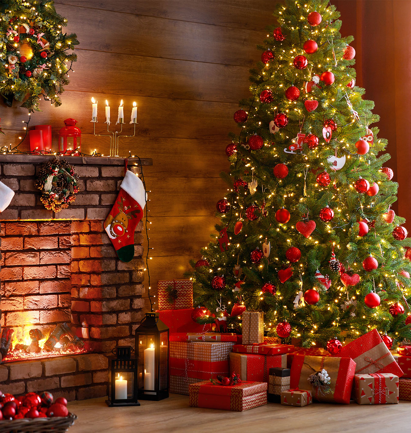 Decorated Christmas Tree with gifts beneath next to a fire place | Salisbury Greenhouse - St. Albert, Sherwood Park
