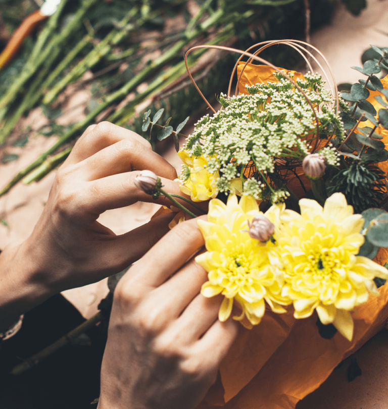 Salisbury at enjoy floral studio woman arranging cut flowers