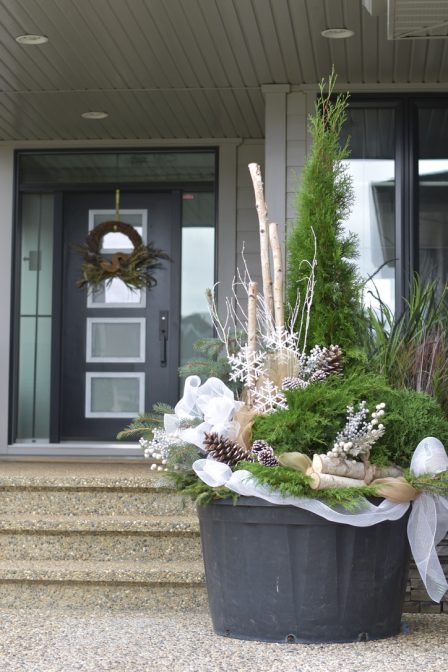 Commercial Winter Planters with White Ribbon, Evergreen and Pinecones | Salisbury Greenhouse - St. Albert, Sherwood Park