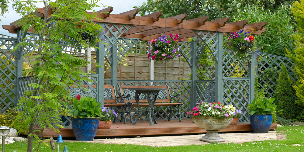 pergola with flower containers
